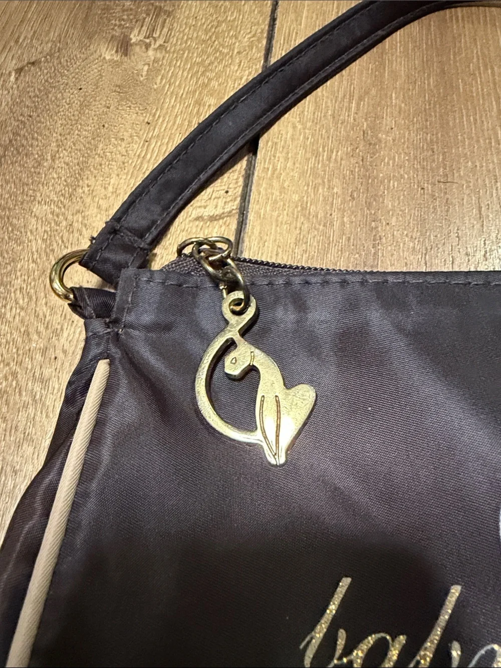 Baby Phat Black Shoulder Bag with Cream Piping and Gold Charm